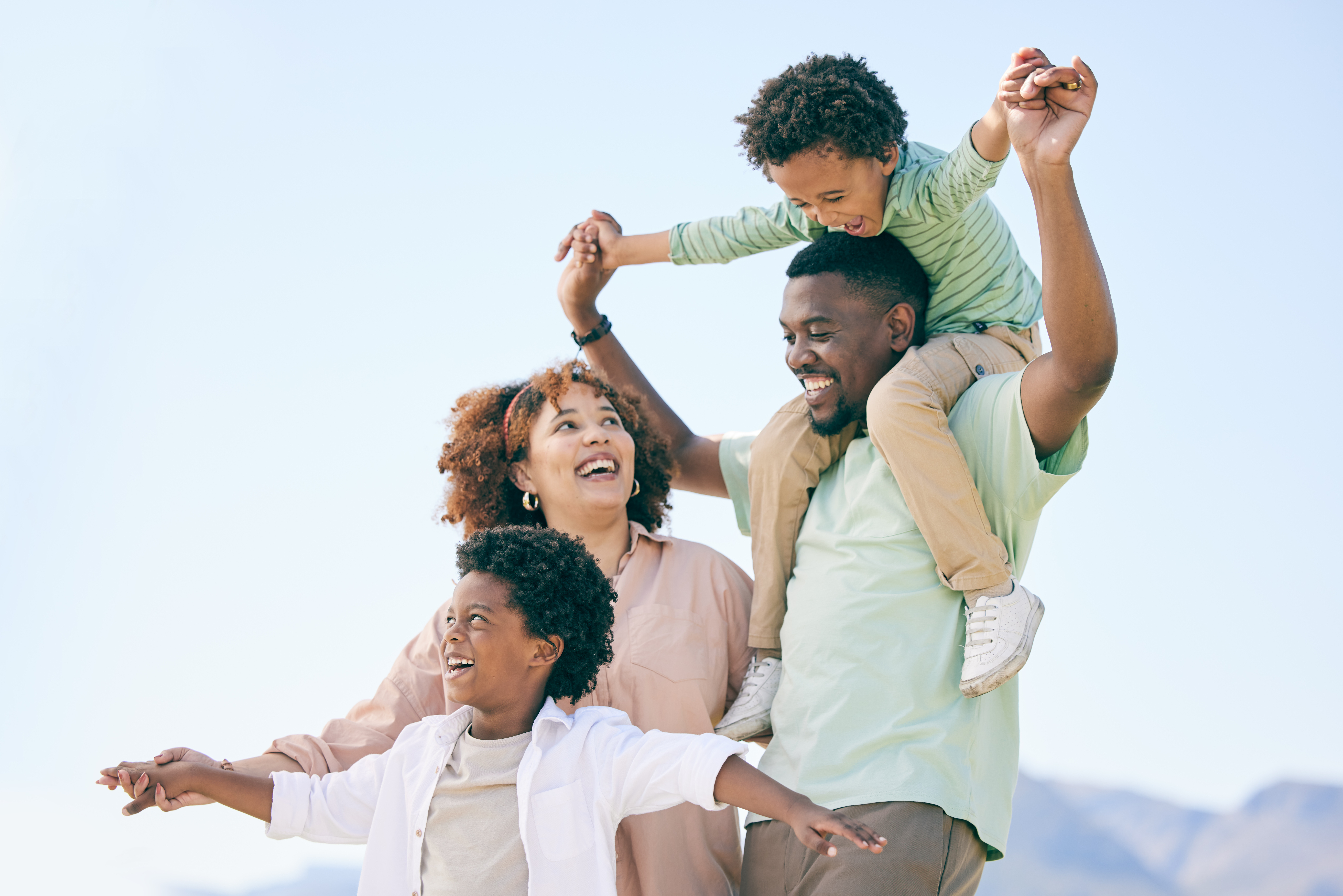 A family engaged in a warm, collaborative activity